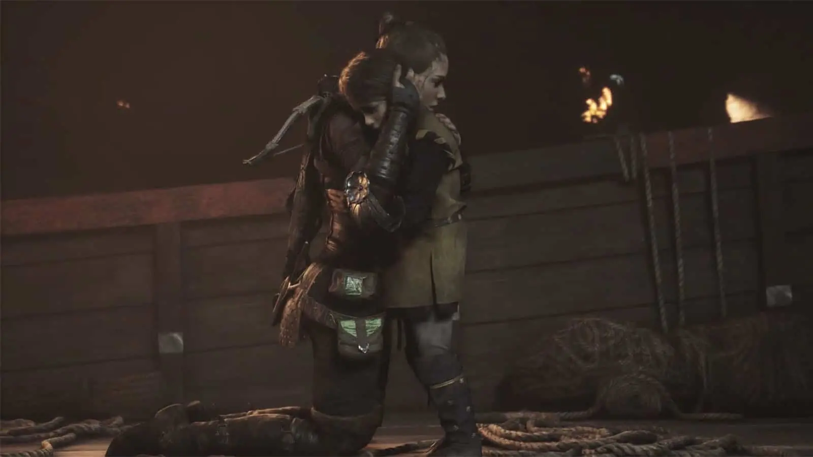 Amicia and Hugo hiding in the shadows while surrounded by a massive swarm of rats in A Plague Tale: Requiem.