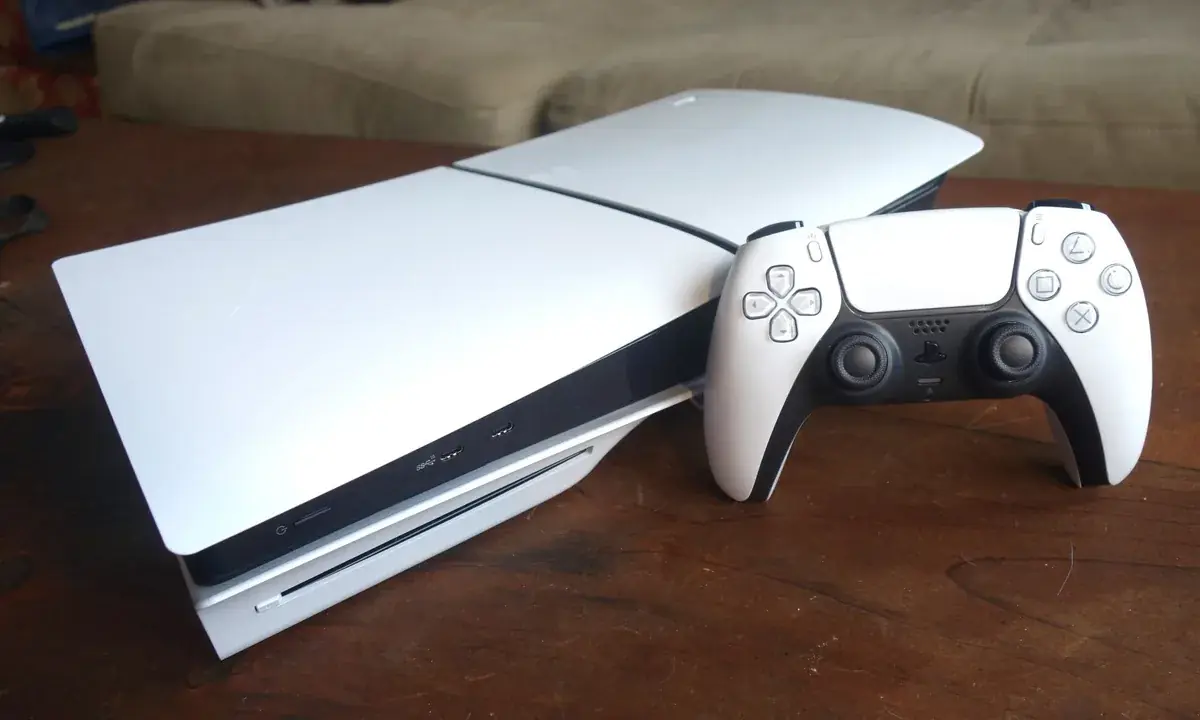 “Sleek, futuristic gaming setup with PS4 and PS5 consoles and controllers, highlighted by neon blue ambient lighting for a game sharing tutorial.”